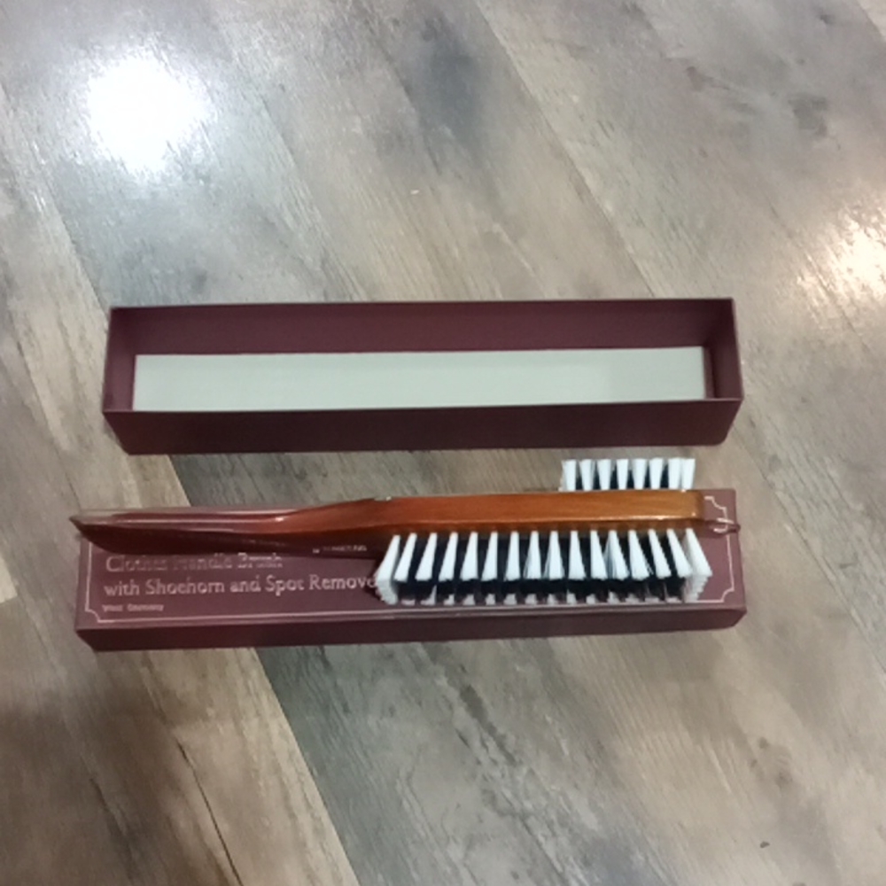 New with box clothes handle brush with shoehorn & spot remover